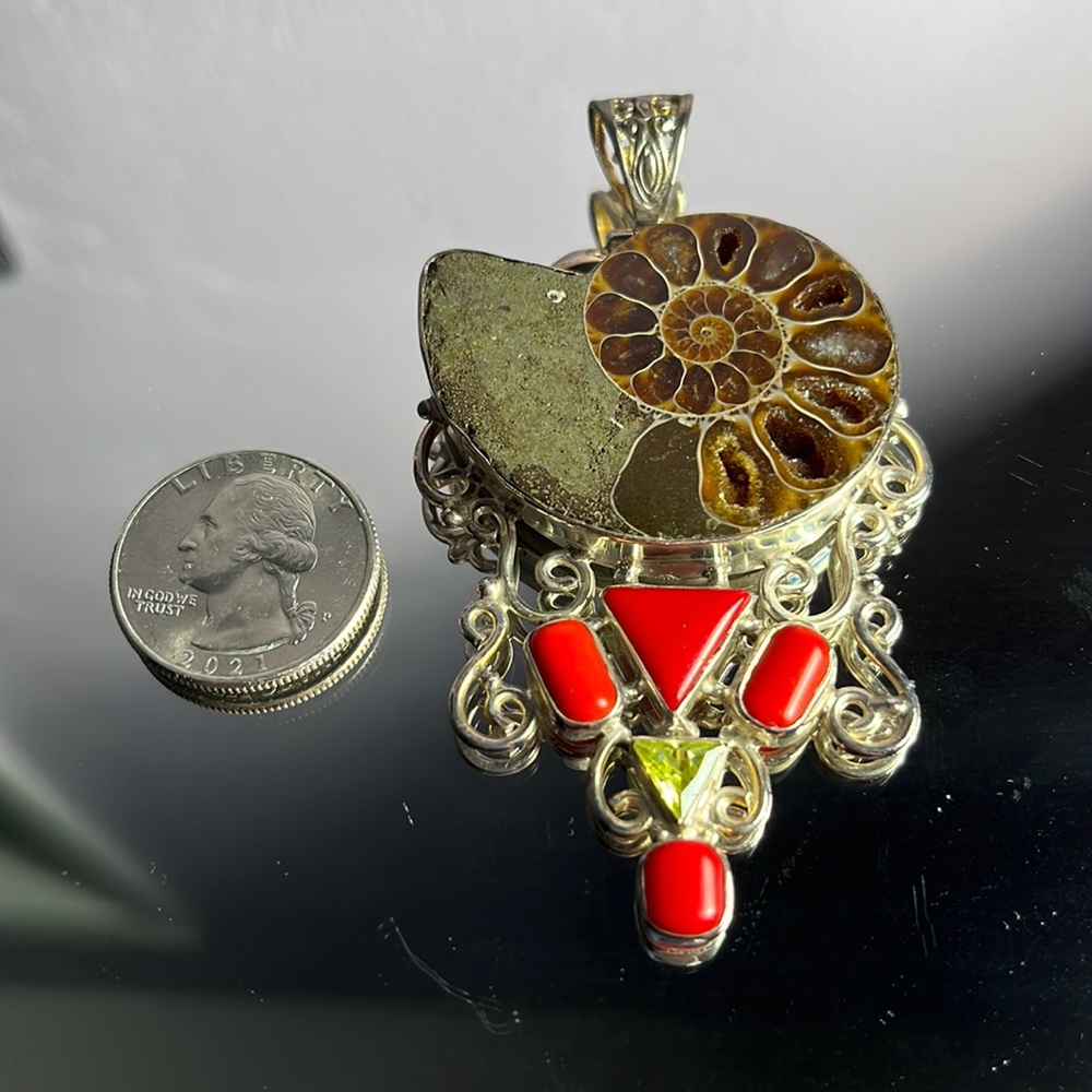 CORAL, PERIDOT, AND SHELL PENDANT